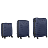 Set of three navy blue hardshell suitcases with wheels.