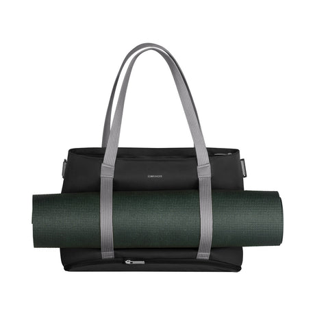 Black tote bag with gray handles carrying a rolled-up yoga mat.