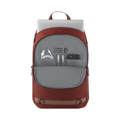 Backpack with open front compartment displaying electronic accessories.