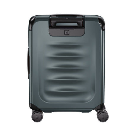 Gray hardshell rolling suitcase with horizontal ridges and a top handle.