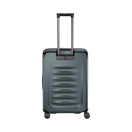 Dark gray hardshell rolling suitcase with an extendable handle and wheels.