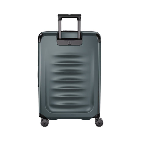 Gray hardshell rolling suitcase with a retractable handle and wheels.