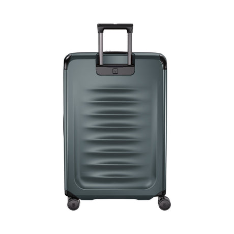 Gray hardshell rolling suitcase with a retractable handle and wheels.