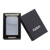 Zippo lighter in its packaging, displaying the product and its box.