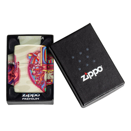 Zippo lighter with a colorful anatomical heart design in its packaging.
