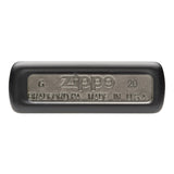 Zippo lighter bottom with embossed text showing brand and origin details.