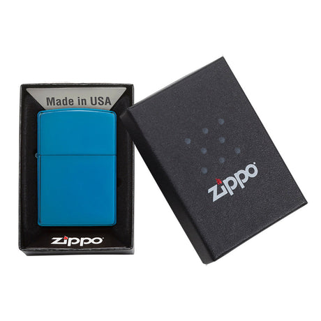 Bright blue Zippo lighter in its packaging box.