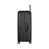 Black hardshell rolling suitcase with vertical ridges and extendable handle.