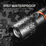 Waterproof flashlight with water droplets on its surface, labeled as IP67 rated.