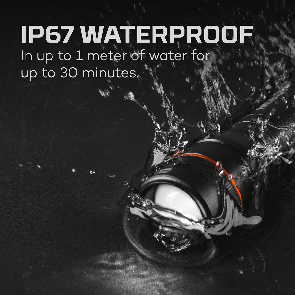 Waterproof electronic device or speaker surrounded by water splashes.