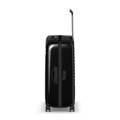 Black hardshell rolling suitcase with an extendable handle.