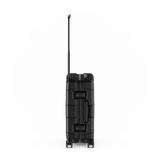 Black hard-shell suitcase with an extendable handle and wheels.
