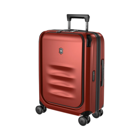 Red hardshell rolling suitcase with a retractable handle and wheels.