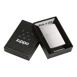 Zippo lighter in its packaging box.