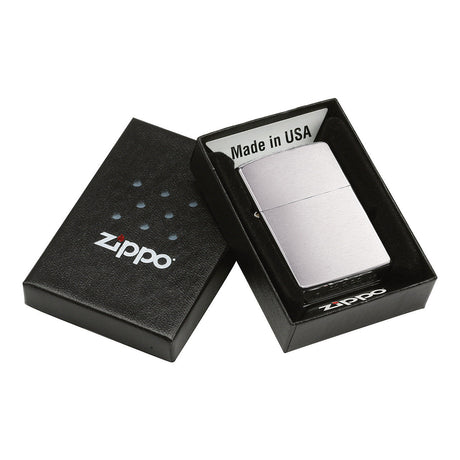 Zippo lighter in its packaging box.