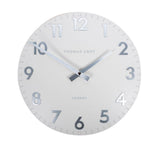 Round white wall clock with pale gray numerals and hands.